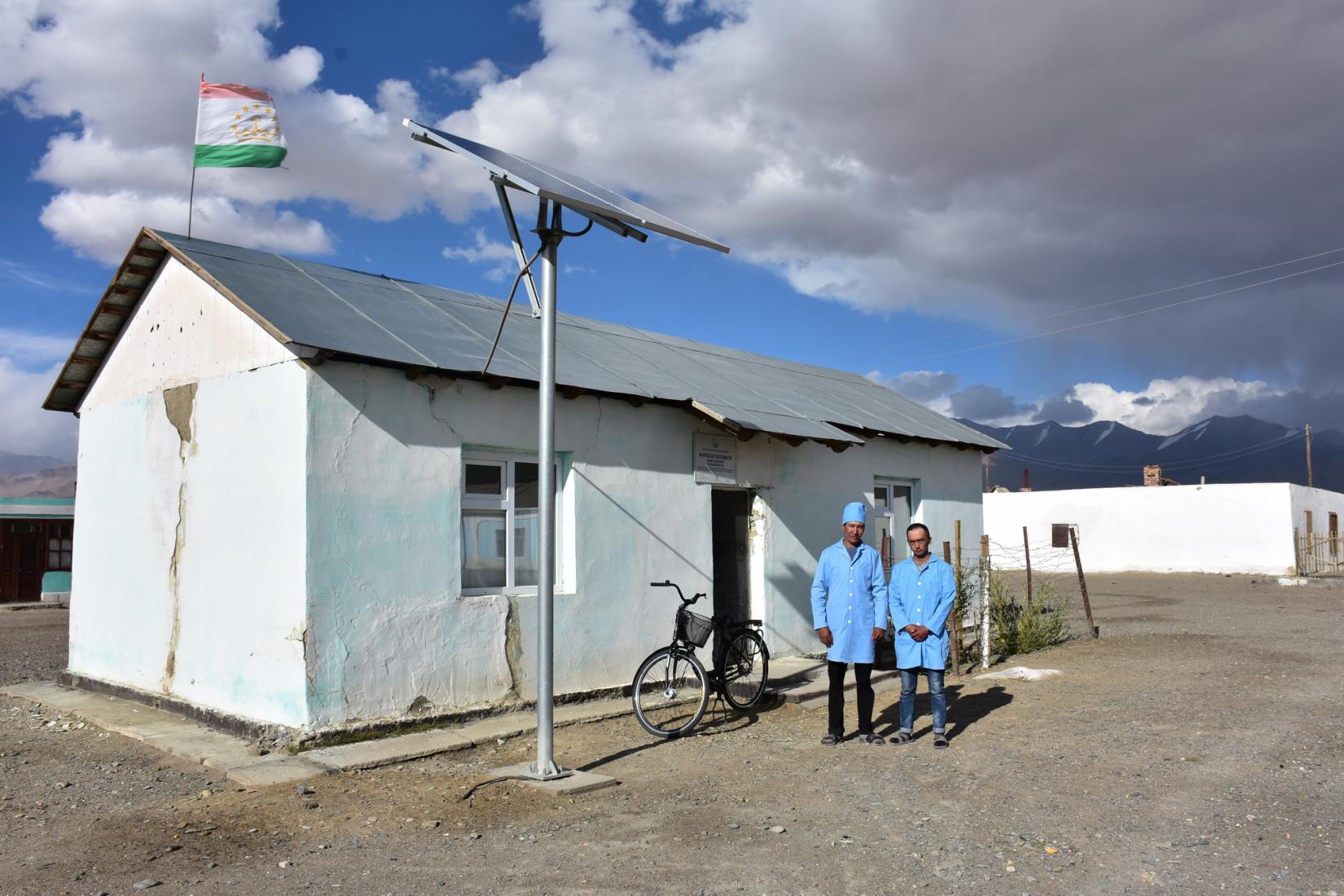 Nurse Yunus (L) and his colleague at the small health house in Karakul