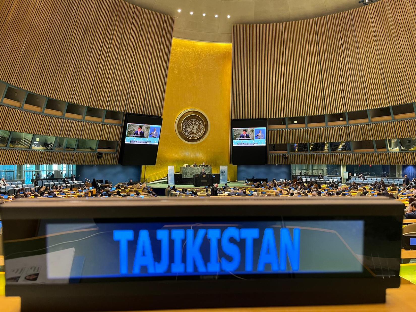 UN General Assembly Meeting Hall with Tajikistan participants presenting the information
